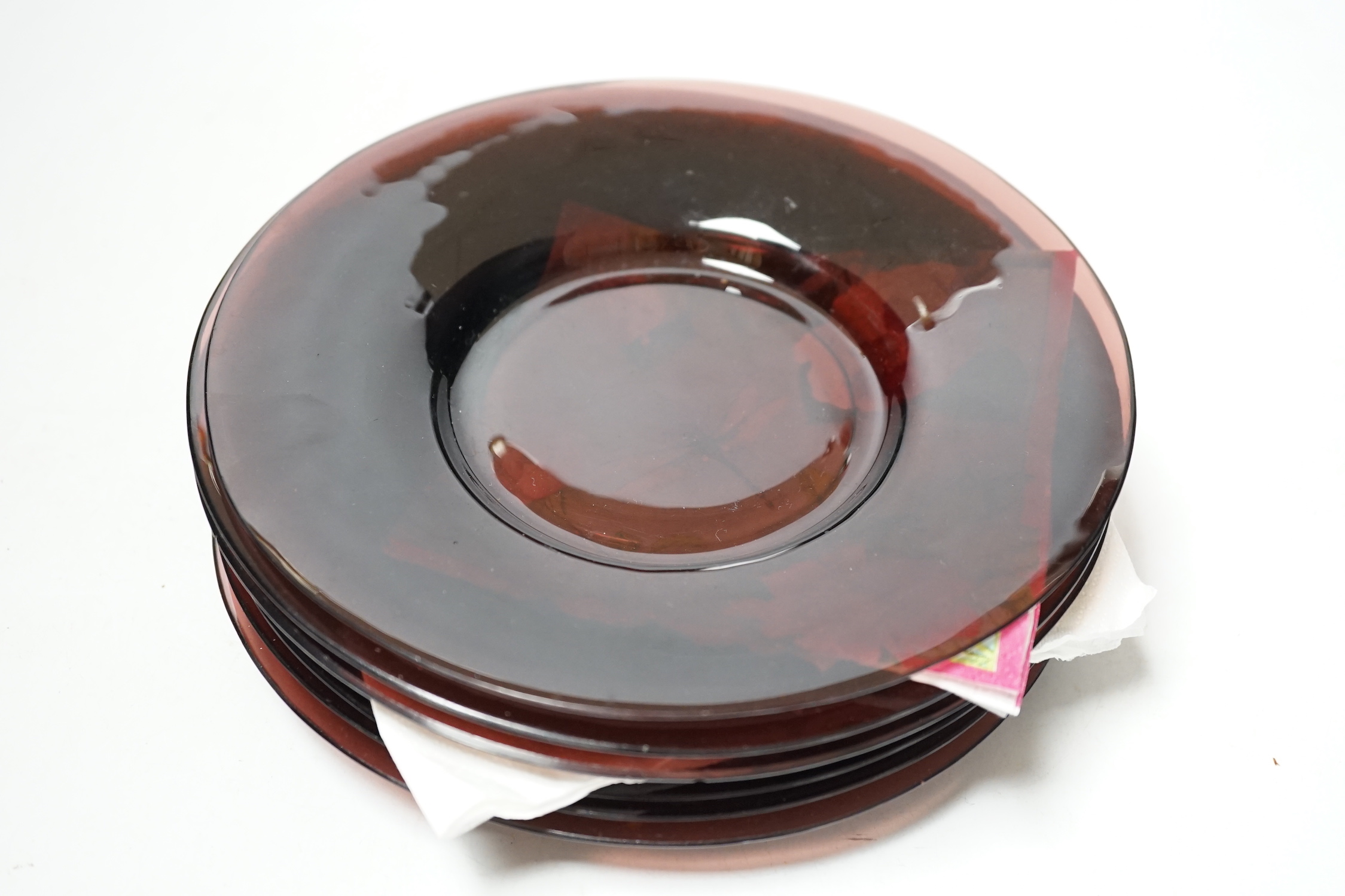 Six 19th century Chinese amethyst glass plates, 19cm diameter